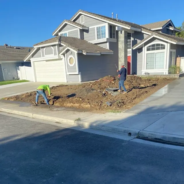 Crew installing artificial turf in Perris, CA