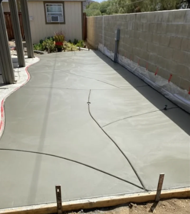 Concrete patio slab with a curved edge
