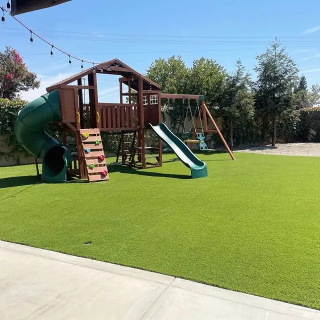 Play structure on artificial turf in Perris, CA