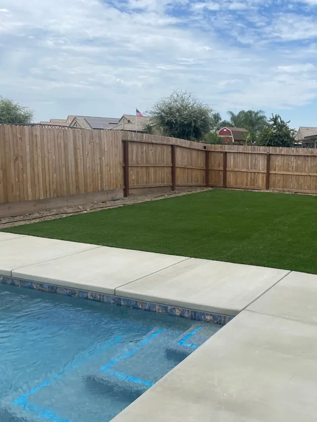 Artificial turf around a pool in Perris, CA
