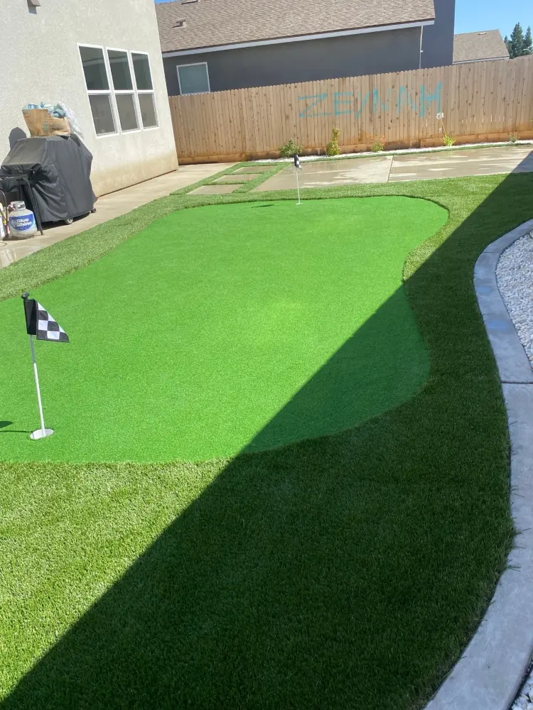 Back yard putting green in artificial turf