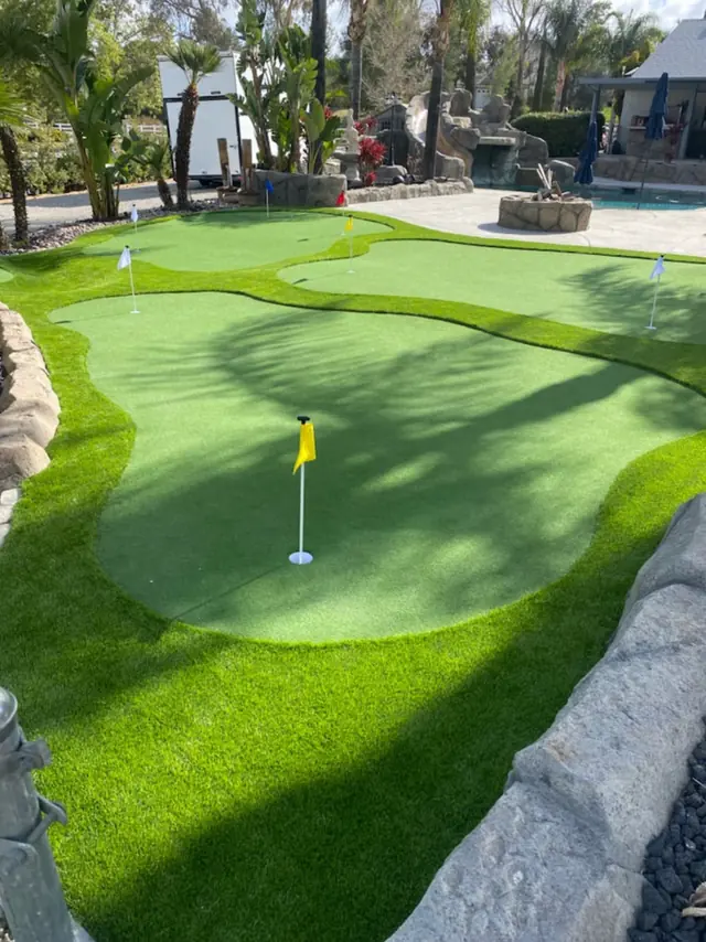 Putting green with a rock border in Perris, CA