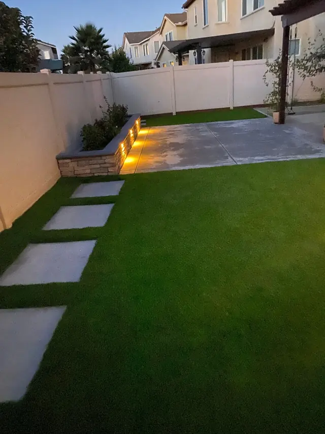 Step stone path through turf in Perris, CA